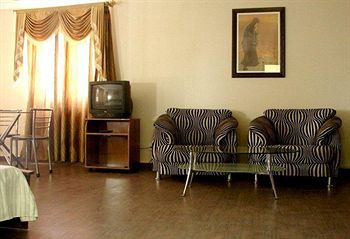 Hotel Emerald Heights Мусори Екстериор снимка